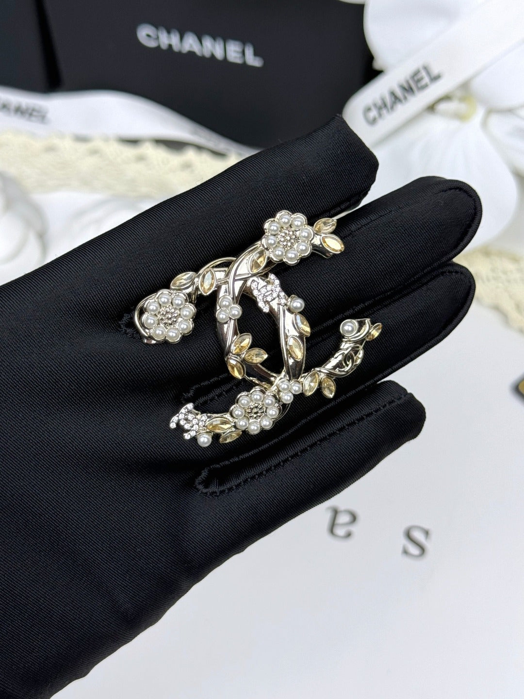 Floral Emblem Brooch with Stone Accents