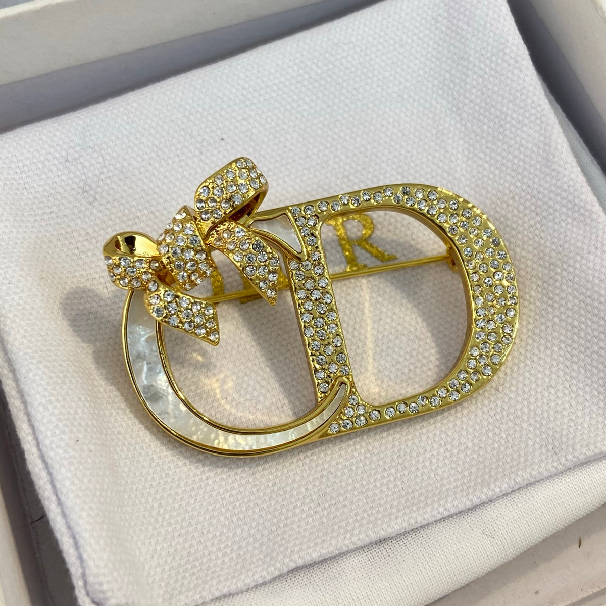Bow & Letter Frame Brooch with Stone Accents
