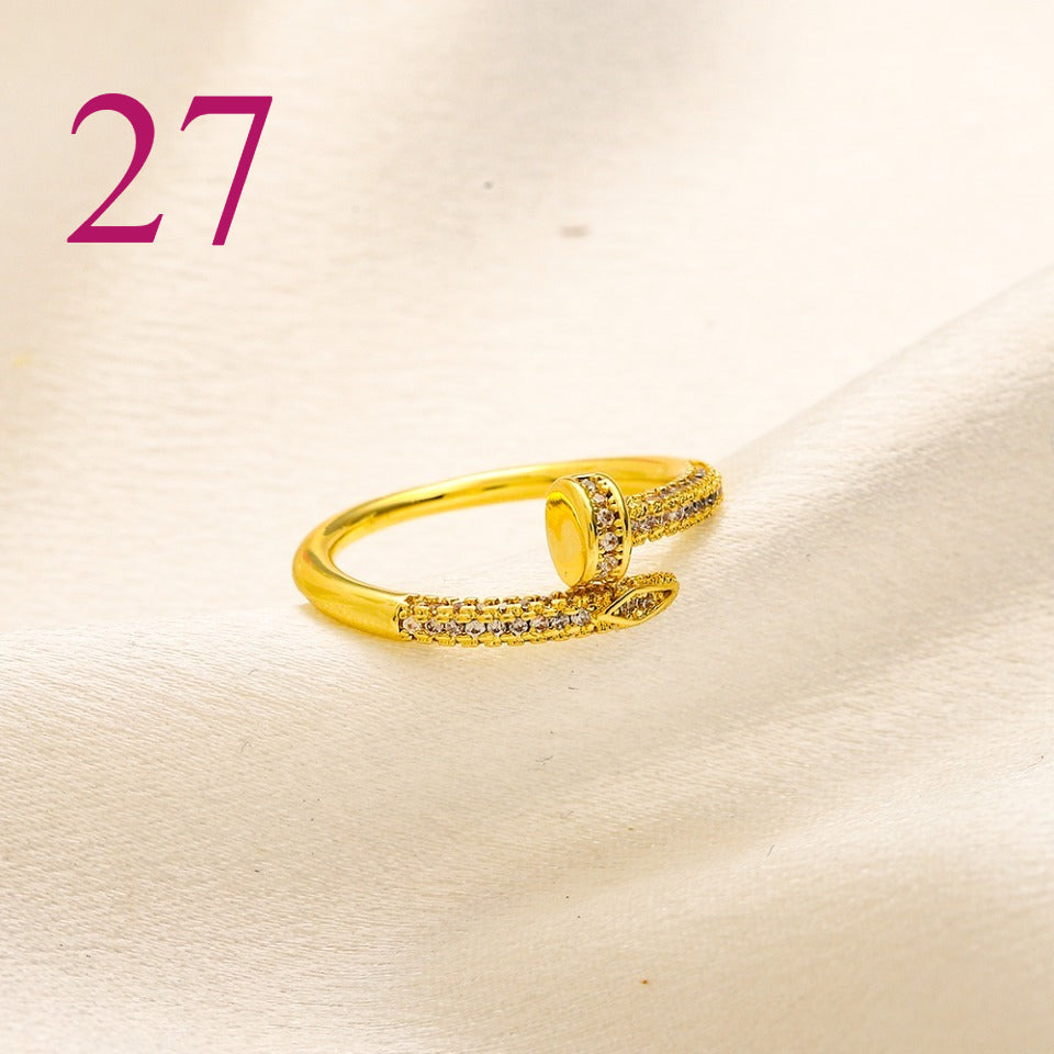Textured Open Band Ring with Interlocking Emblem