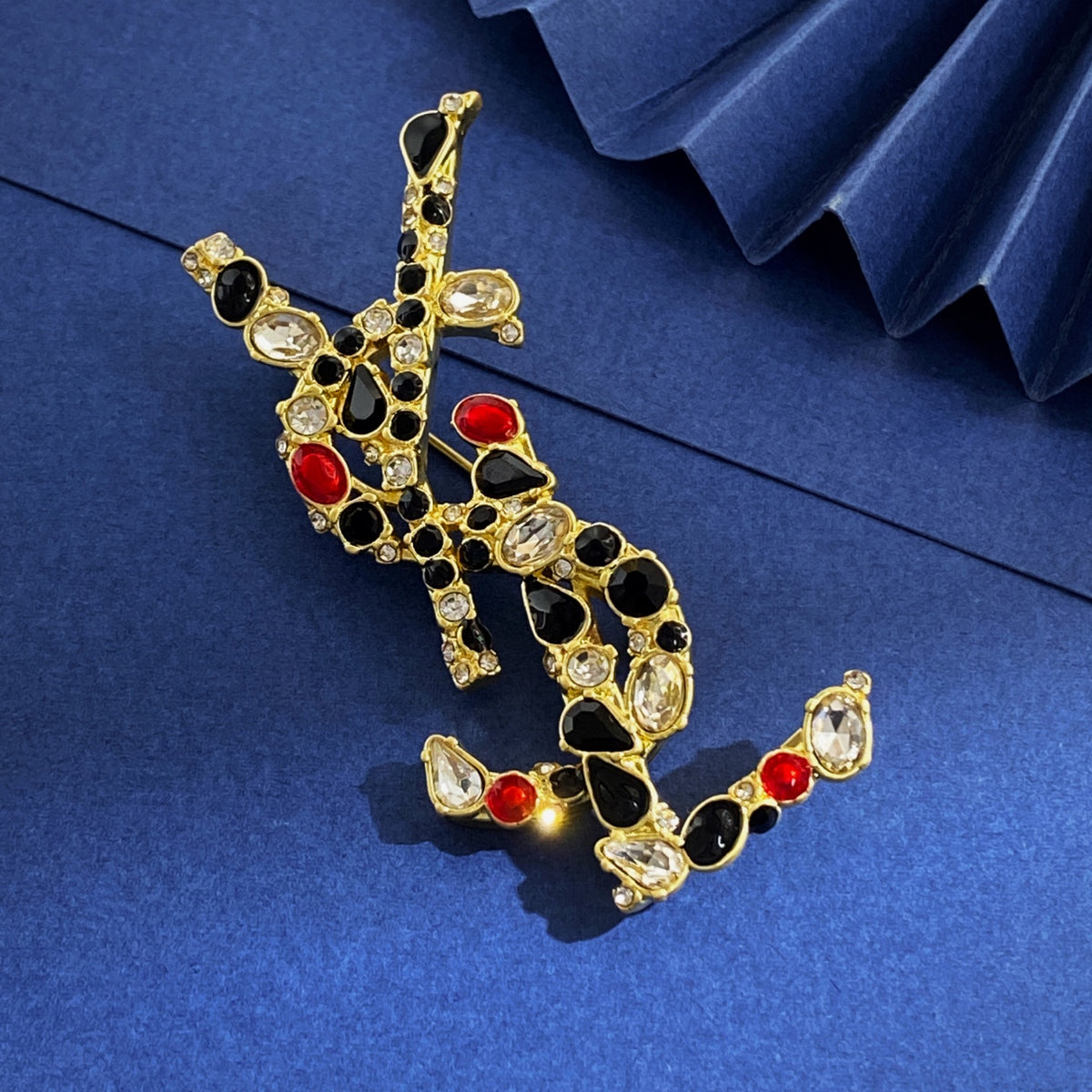 Colorful Stone-Set Letter Emblem Brooch