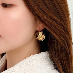 Boucles d'oreilles dôme matelassées