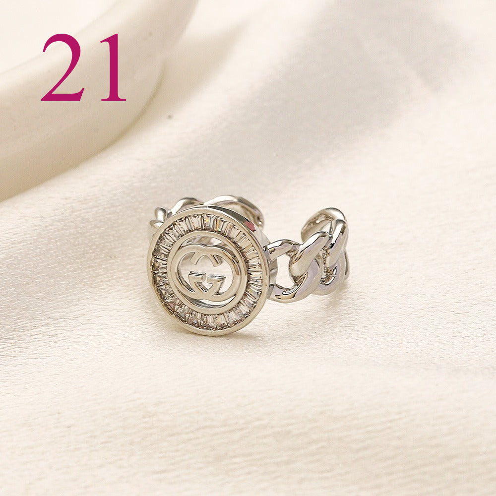 Textured Open Band Ring with Interlocking Emblem