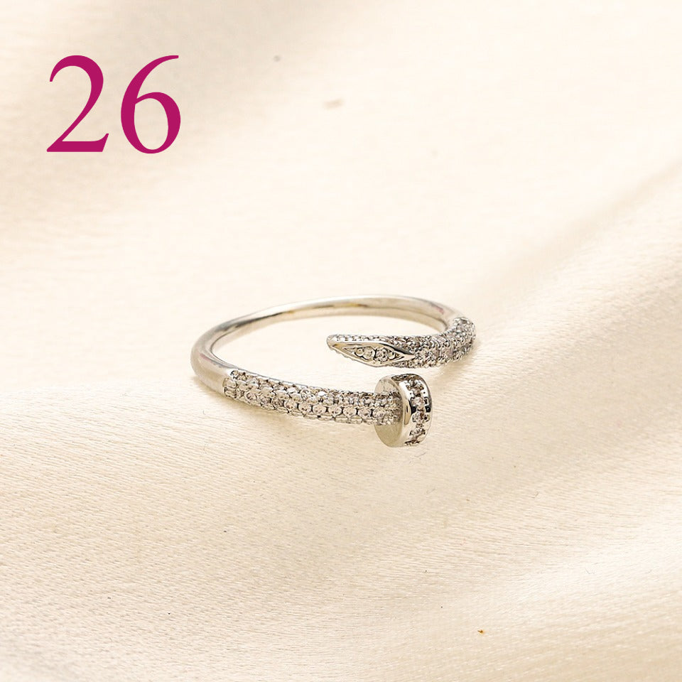 Textured Open Band Ring with Interlocking Emblem
