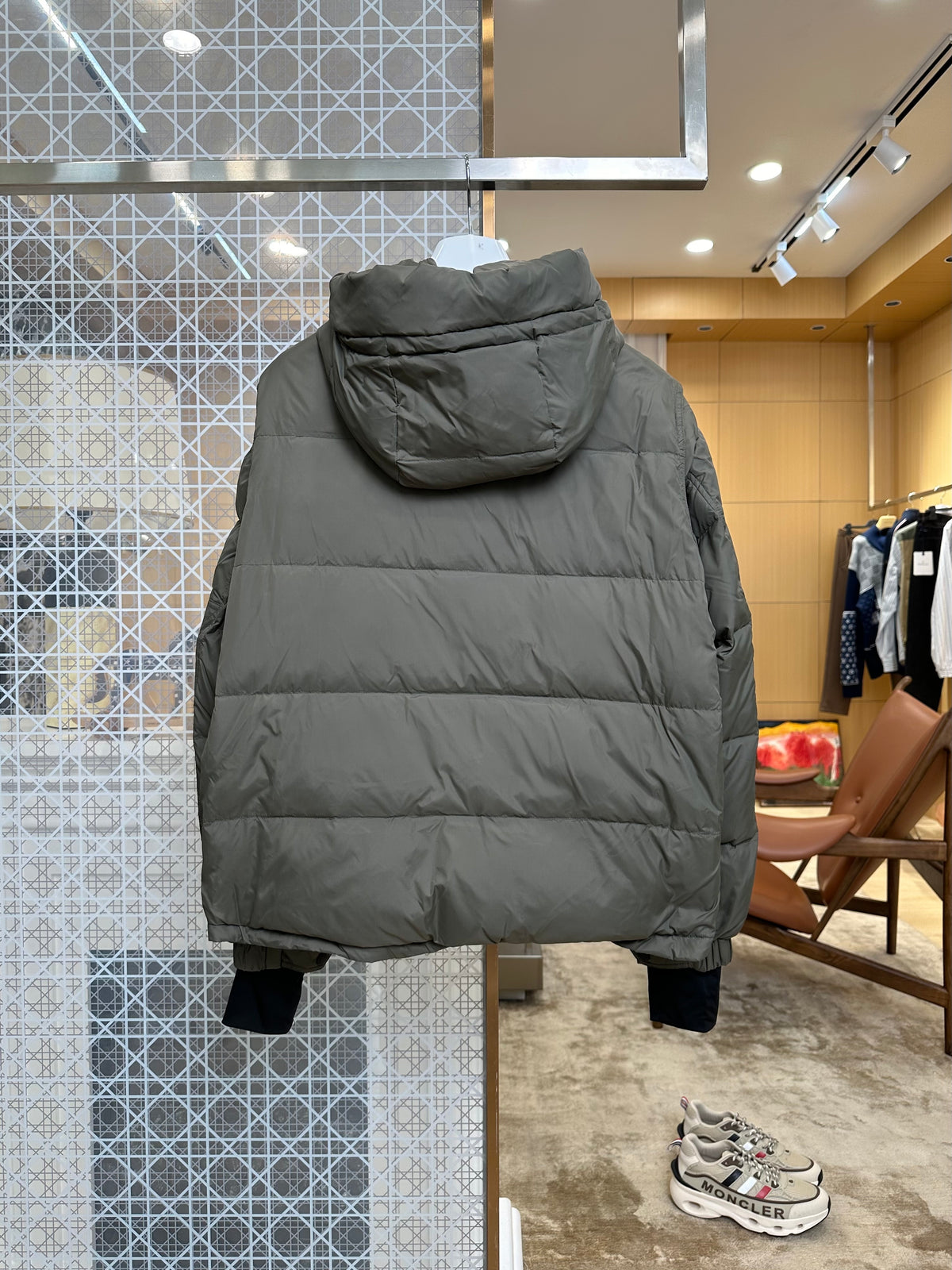 Hooded quilted puffer jacket product photograph