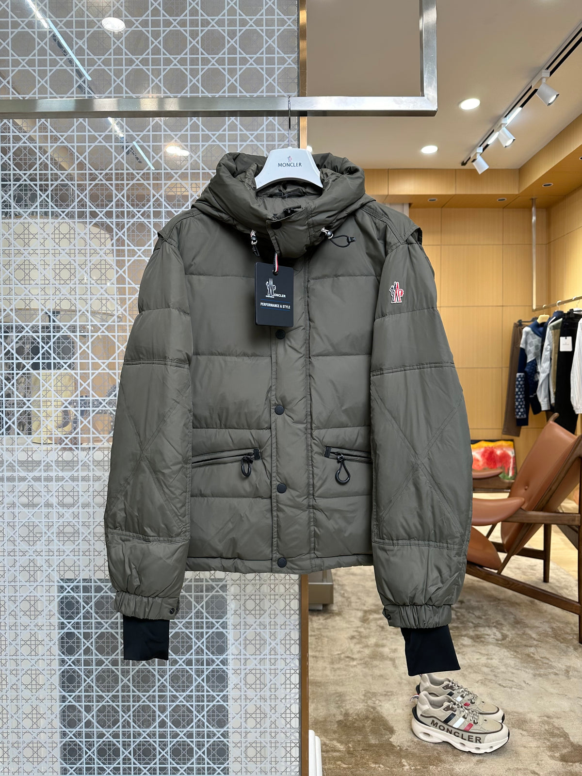 Hooded quilted puffer jacket product photograph