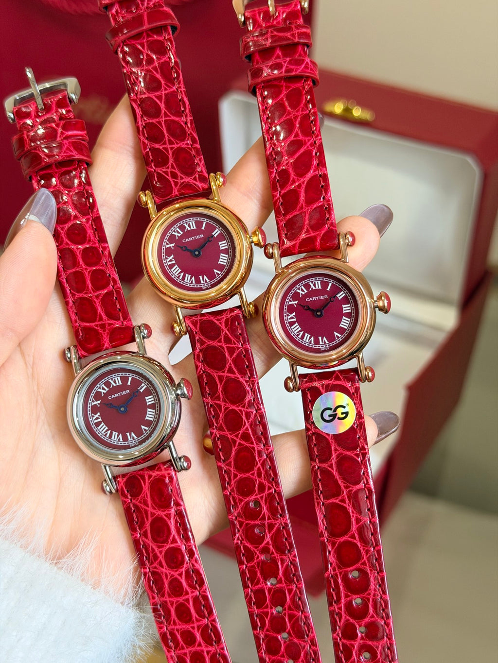 Burgundy dial watch with red strap