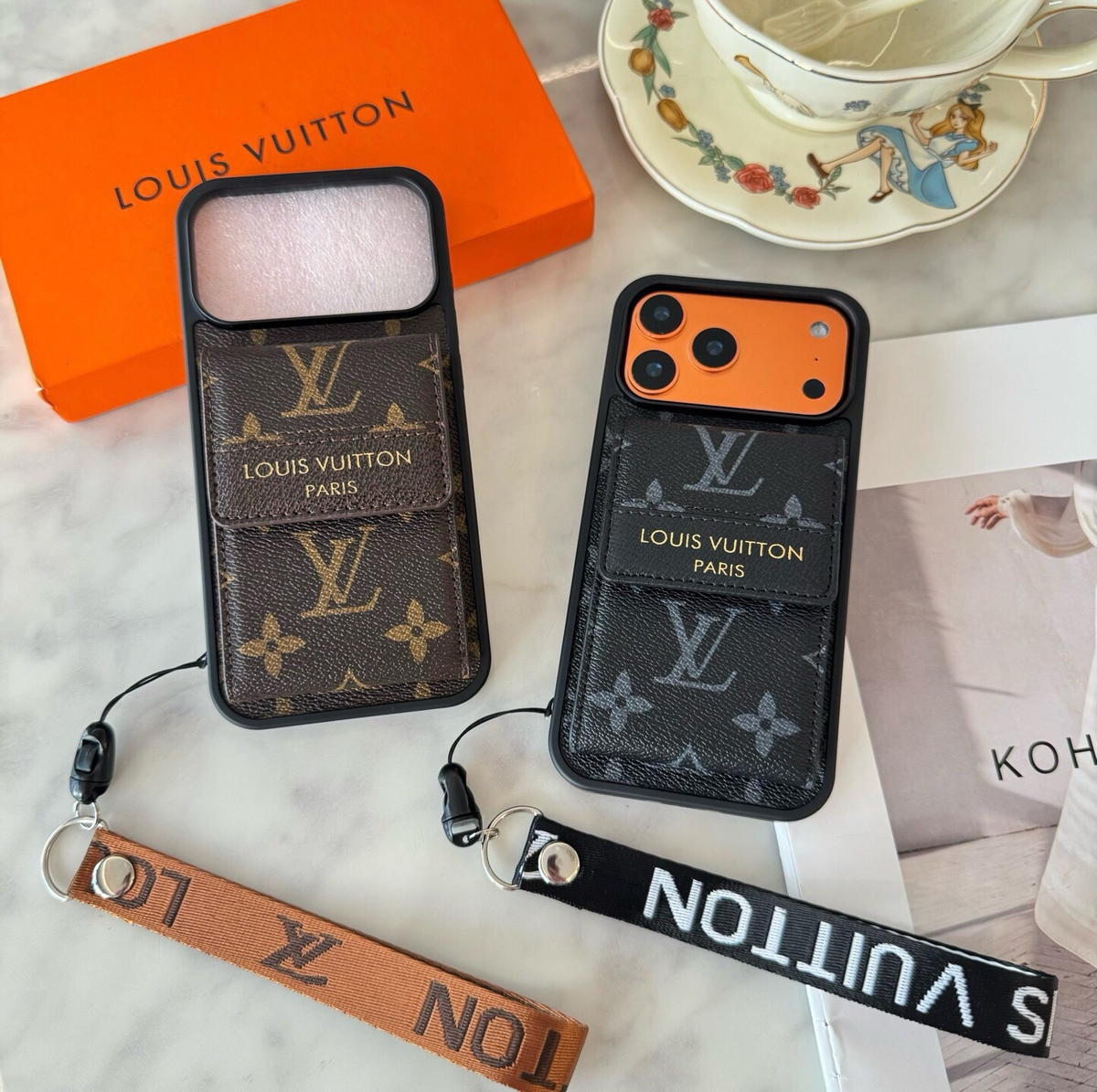Brown and black monogram phone cases with flap card pockets and wrist straps