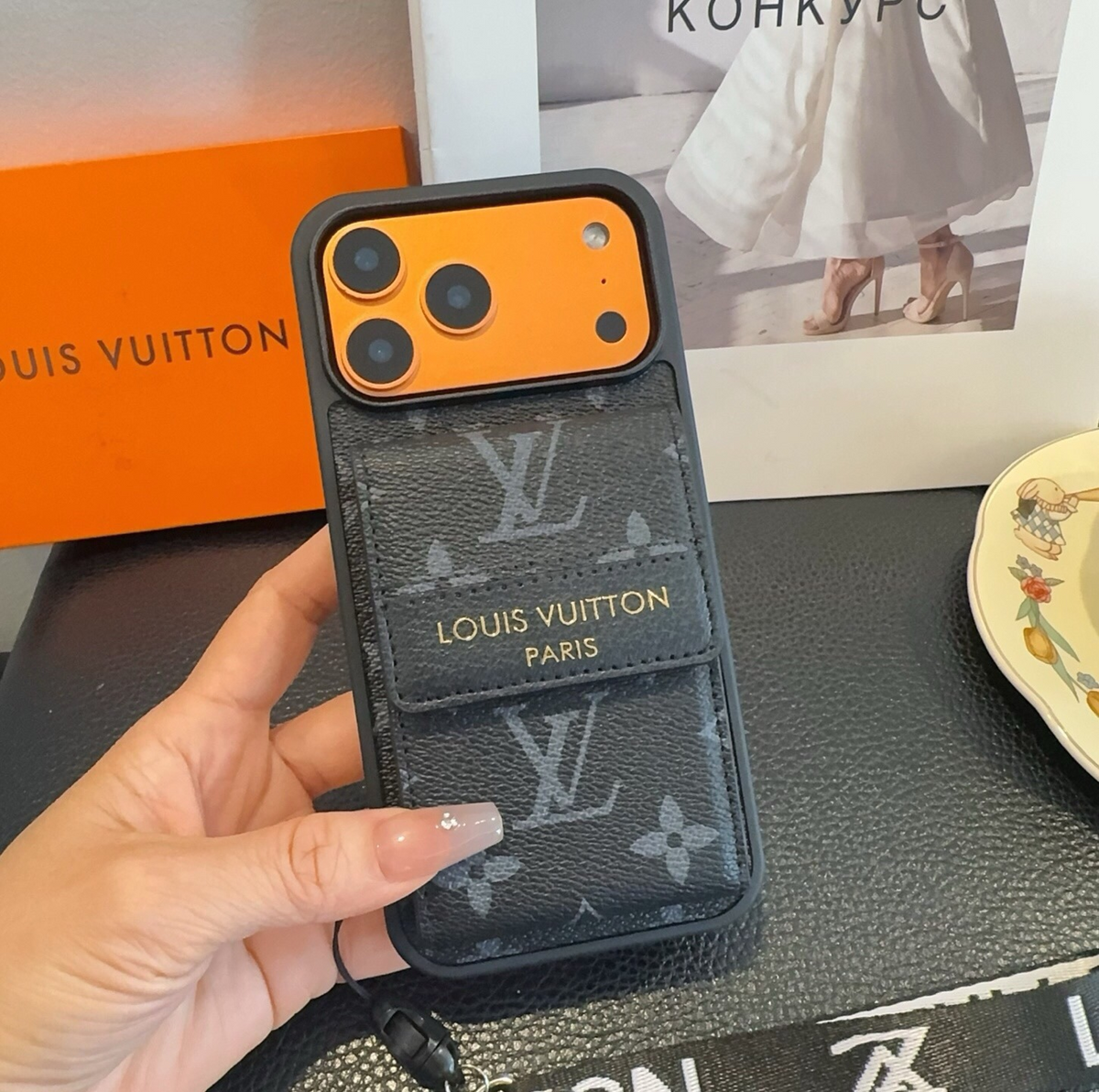Black monogram phone case with flap card pocket and wrist strap, detail 7