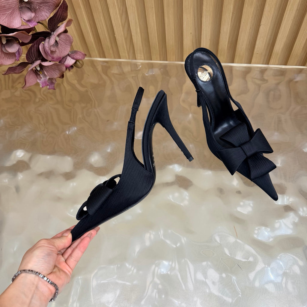 Black bow-detail pointed-toe slingback heels