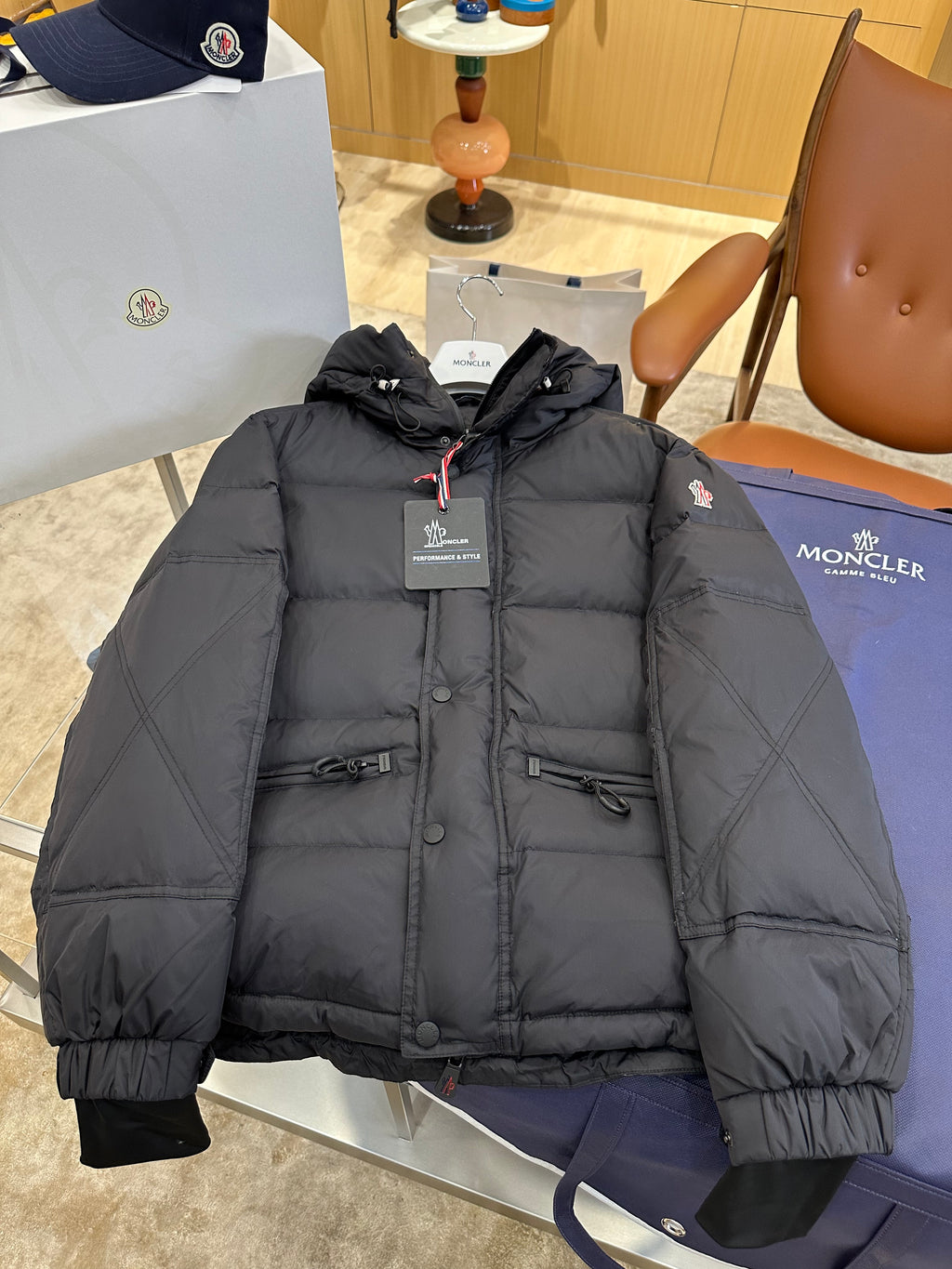 Hooded quilted puffer jacket product photograph