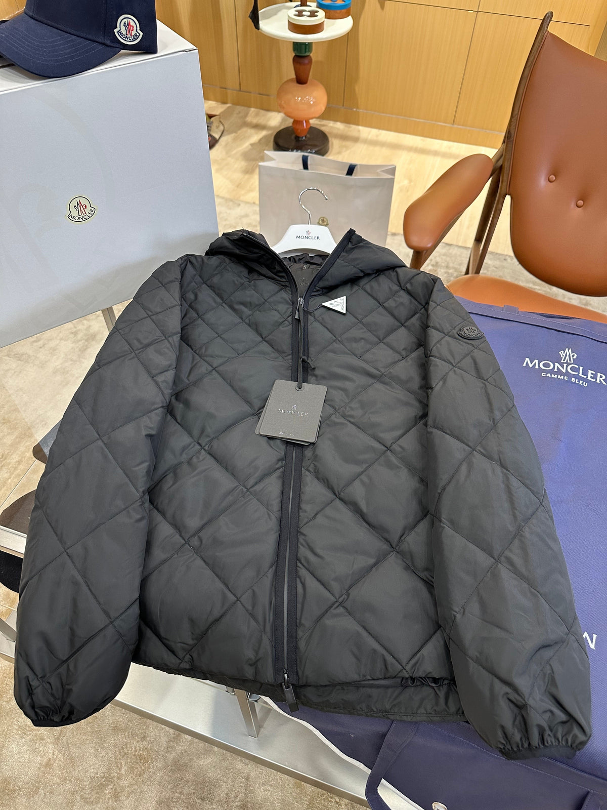Lightweight Hooded Down Jacket with Quilted Panels