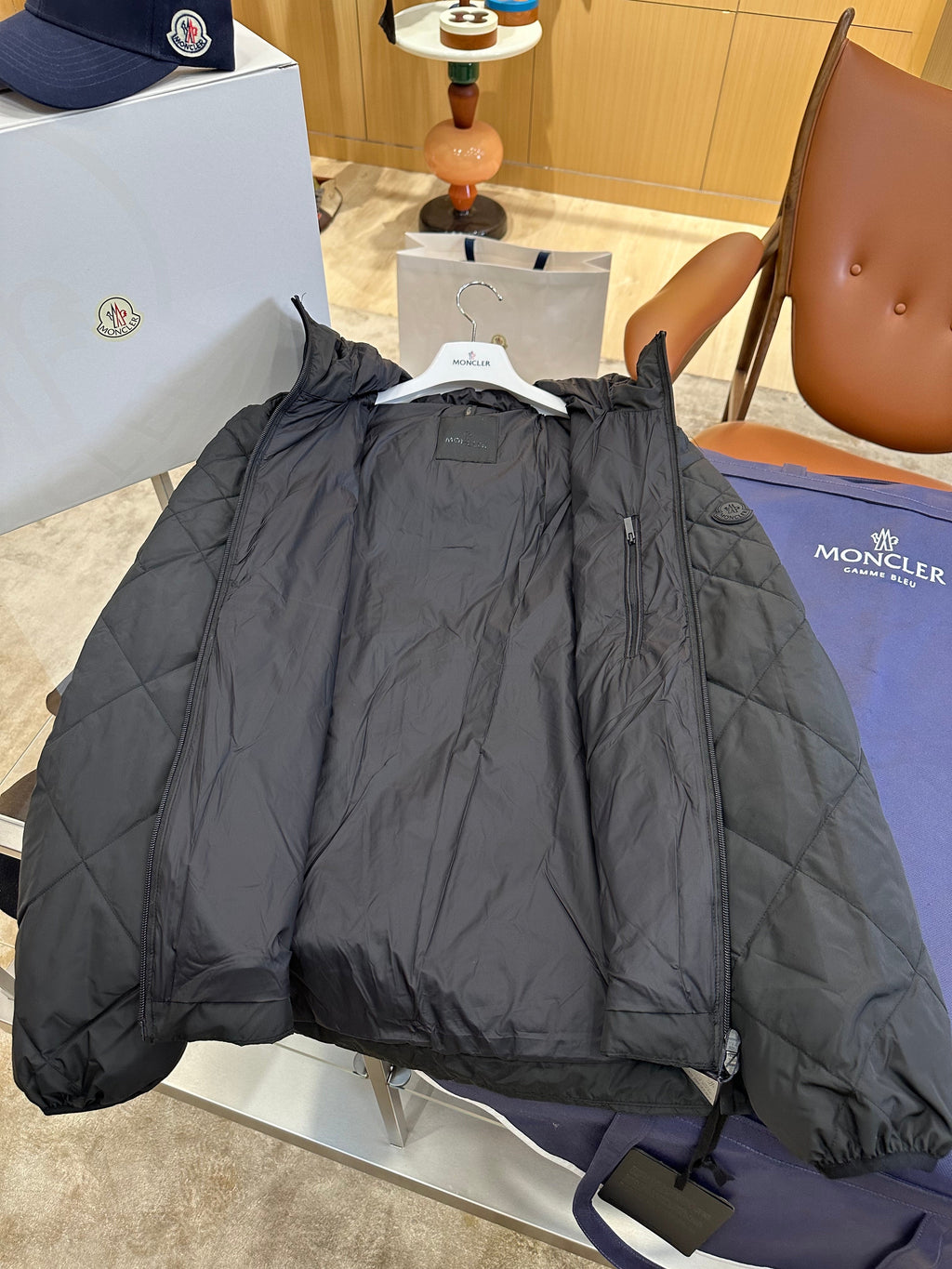 Lightweight Hooded Down Jacket with Quilted Panels