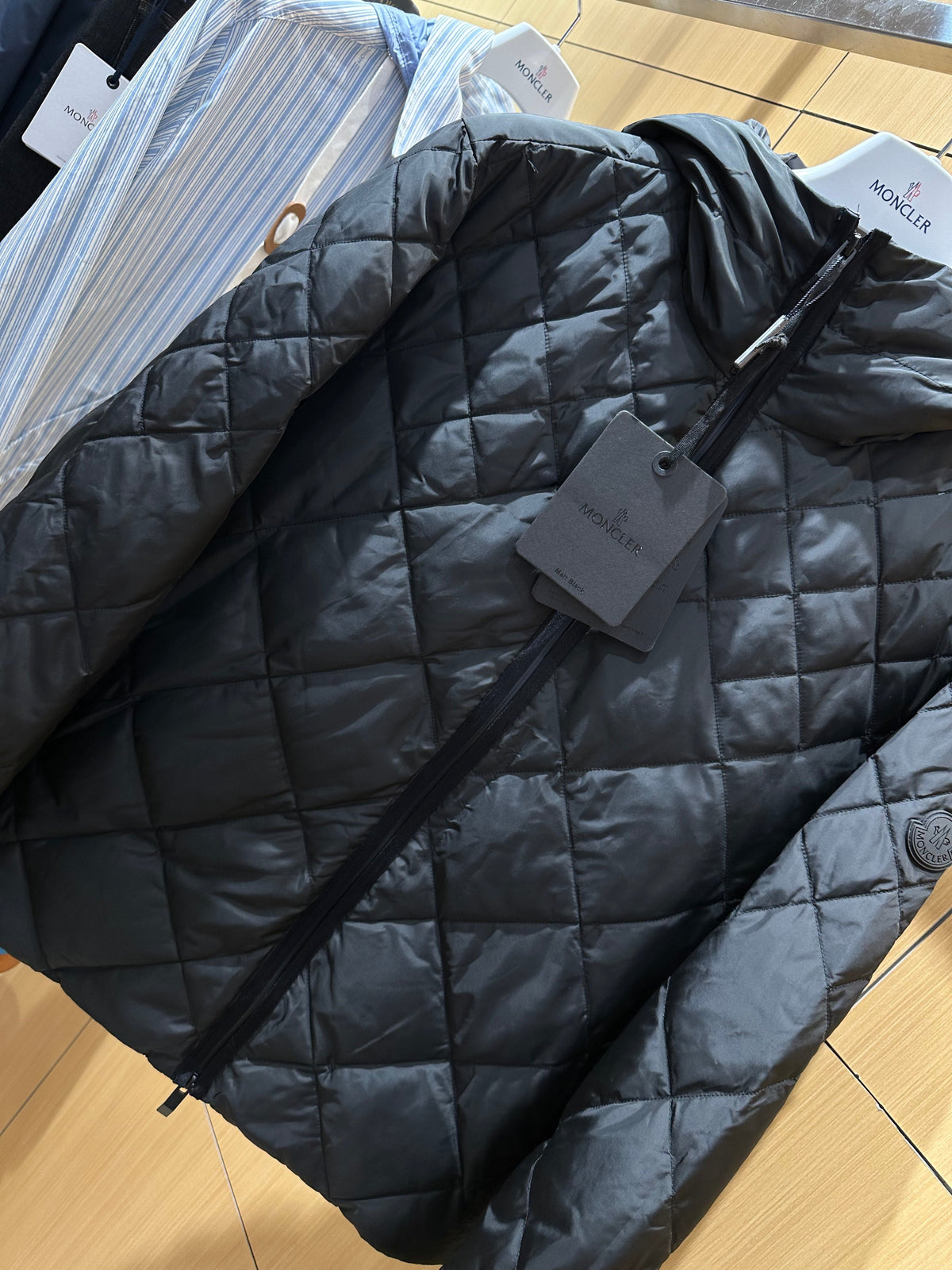 Lightweight Hooded Down Jacket with Quilted Panels